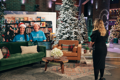 Maureen and Jessica on a big screen TV on set at the Kelly Clarkson Show all decked out for the holidays, photo provided by the show